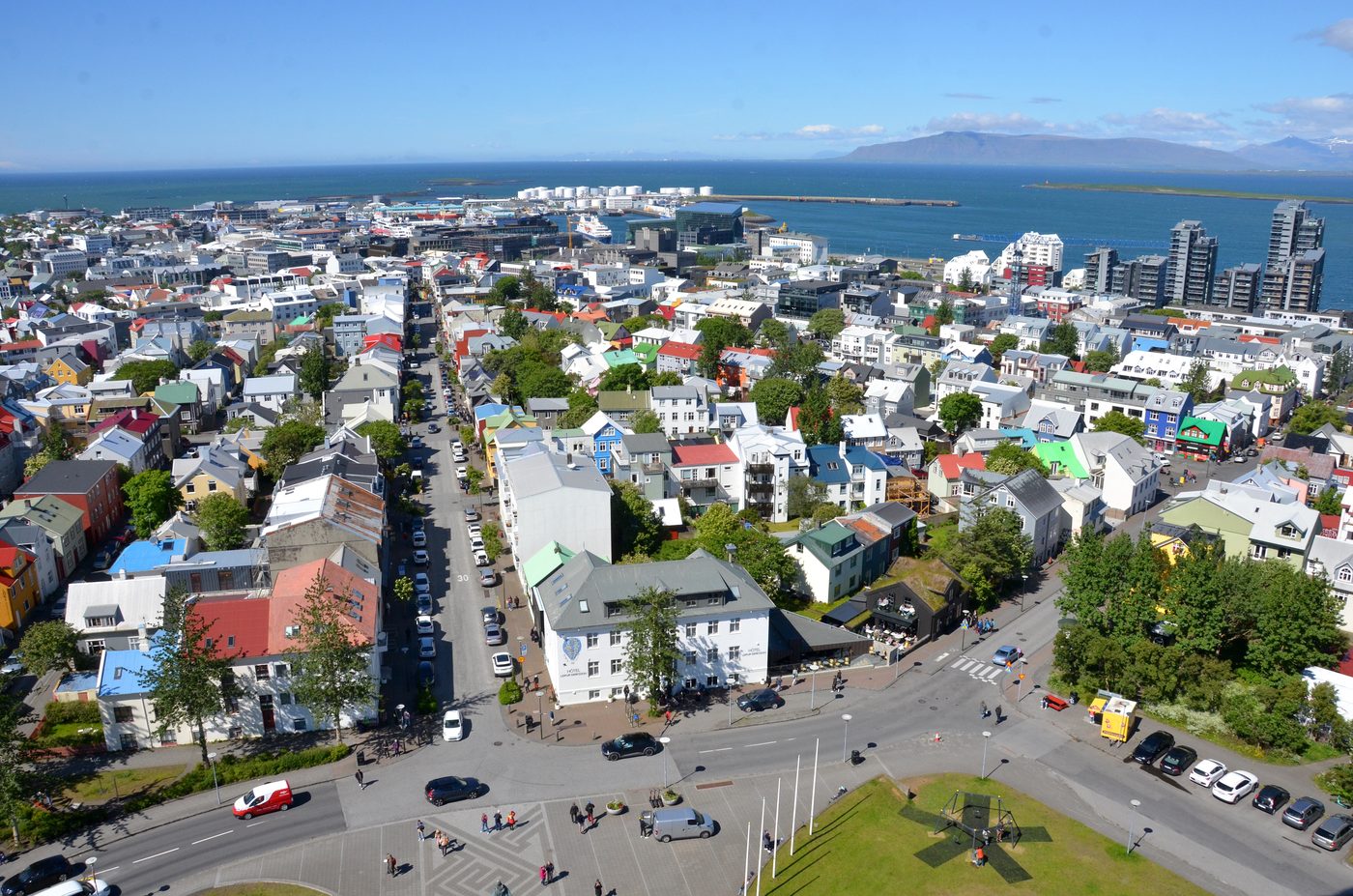 Reykjavik rooftops with mountains behind